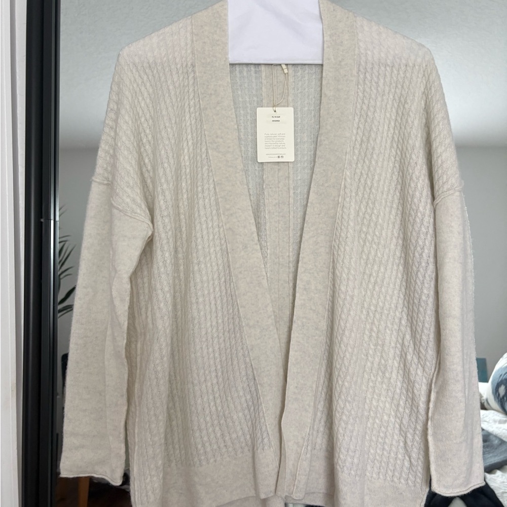 Kinross featherweight Cashmere Sweater in whisper. Elegant for year round wear.